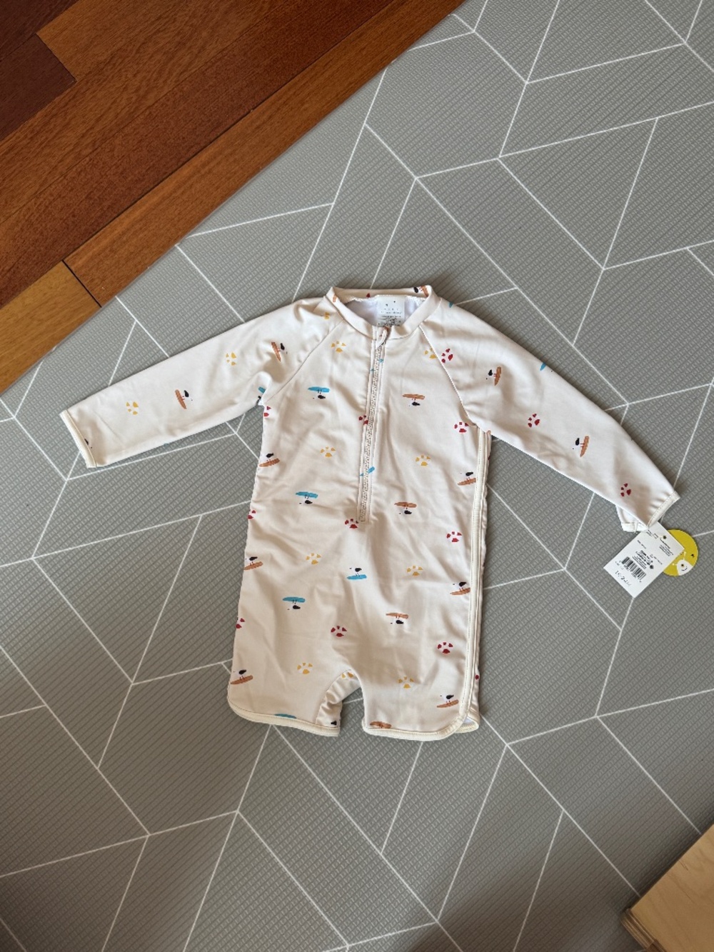 Rise little earthling long sleeve swimsuit